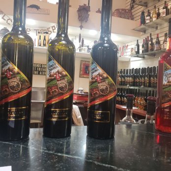 Spero Winery - bottles of wine lined up on a bar - Wineries Near Me - Denver, Colorado Spero Winery - bottles of wine lined up on a bar - Wineries Near Me - Denver, Colorado