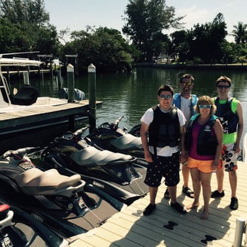 AMI Watersports - Excited family ready to see the island from the water on our local island tour. - Boating Near Me - Holmes Beach, Florida