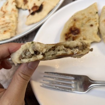 La Numero Uno - Inside steak pupusa (there is cheese) - Mexican Near Me - Los Angeles, California