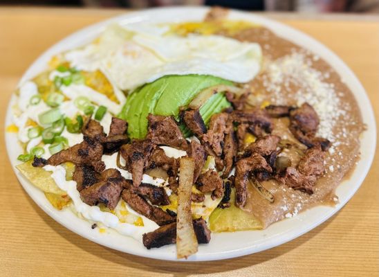Photo of Loaded Cafe - Santa Ana First Street - Santa Ana, CA, US. Asada Chilaquiles Plate