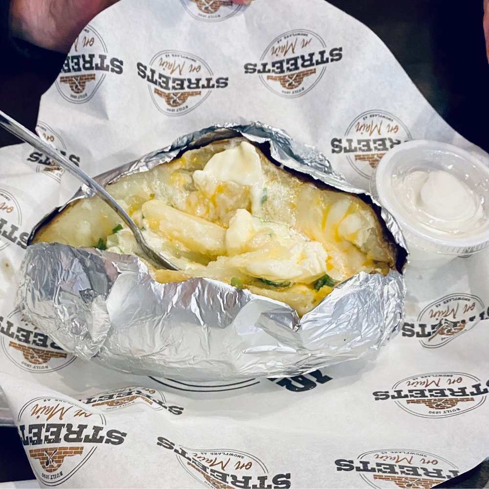 Streets On Main - The biggest baked potato I've ever seen! - American Near Me - Snowflake, Arizona Streets On Main - The biggest baked potato I've ever seen! - American Near Me - Snowflake, Arizona