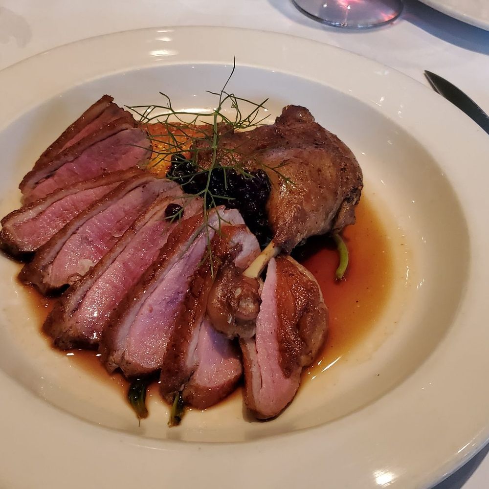 Higgins Restaurant - Duck Breast and Duck Leg Confit. The breast was outstanding! Came with a blueberry wine reduction sauce. - French Near Me - Portland, Oregon Higgins Restaurant - Duck Breast and Duck Leg Confit. The breast was outstanding! Came with a blueberry wine reduction sauce. - French Near Me - Portland, Oregon