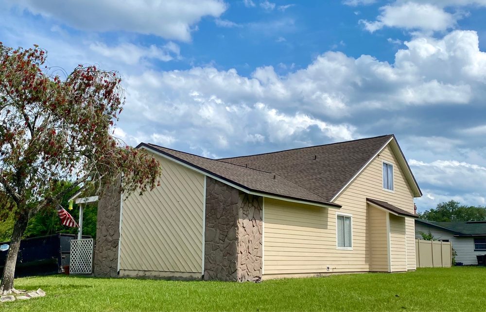 Slide of J&M Roofing Services