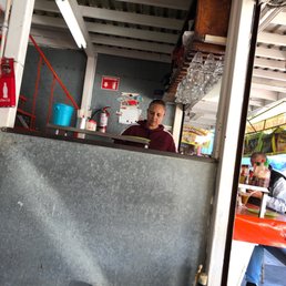 Owner cooking the tacos! Owner cooking the tacos!