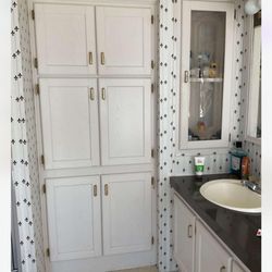 Building Maintenance Solutions - Old linen cabinet