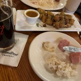 Sausages with cabbage. Baked cheese balls. German beer. Sausages with cabbage. Baked cheese balls. German beer.