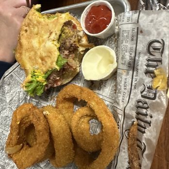 Penelope's World Famous Burgers & Fries - Tapped out: onion rings, 1/3 Pattie with American cheese & toppings offered - American Near Me - Estes Park, Colorado Penelope's World Famous Burgers & Fries - Tapped out: onion rings, 1/3 Pattie with American cheese & toppings offered - American Near Me - Estes Park, Colorado