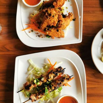 Pho Saigon House - Pork Skewer and butter garlic fried chicken Appetizer. - Vietnamese Near Me - Tacoma, Washington Pho Saigon House - Pork Skewer and butter garlic fried chicken Appetizer. - Vietnamese Near Me - Tacoma, Washington