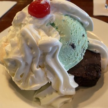 Donovan's Irish Pub - Brownie sundae with mint chocolate chip ice cream - Irish Near Me - Holyoke, Massachusetts Donovan's Irish Pub - Brownie sundae with mint chocolate chip ice cream - Irish Near Me - Holyoke, Massachusetts