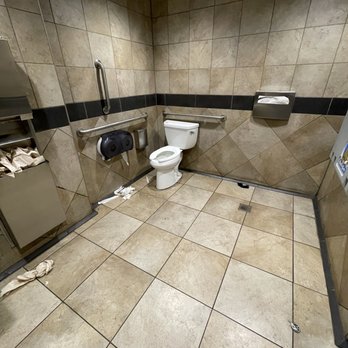 QuikTrip - a public restroom with a toilet and paper dispenser - Gas Stations Near Me - Woodstock, Georgia QuikTrip - a public restroom with a toilet and paper dispenser - Gas Stations Near Me - Woodstock, Georgia