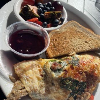 Heritage Cafe - CARNITAS OMELETTE with side of blueberry compote for toast - Breakfast & Brunch Near Me - Aurora, Colorado