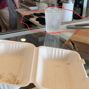 Series A Coffee - Grounds all over the counter, tongs sitting out of safe storage area, and barista beverage sitting uncovered near customer food - Coffee & Tea Near Me - Beverly Hills, California Series A Coffee - Grounds all over the counter, tongs sitting out of safe storage area, and barista beverage sitting uncovered near customer food - Coffee & Tea Near Me - Beverly Hills, California