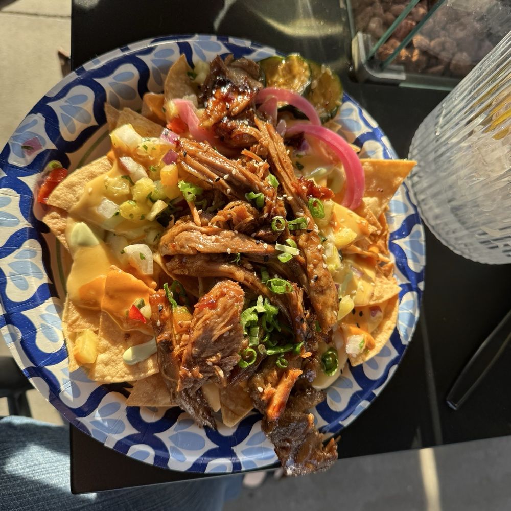 Island Nachos with teriyaki pork. Island Nachos with teriyaki pork.
