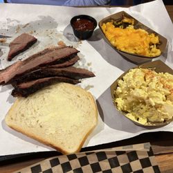 Brisket with side of Mac n Cheese and Potato Salad.