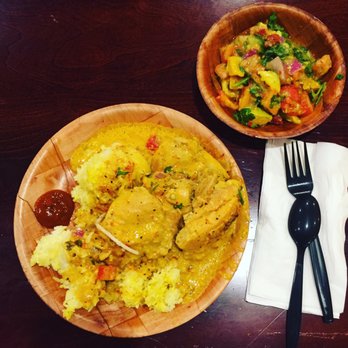 Da Spot - Super delicious lemon coconut chicken with saffron rice and a side salad of avocado and tomatoes. - Mediterranean Near Me - Honolulu, Hawaii