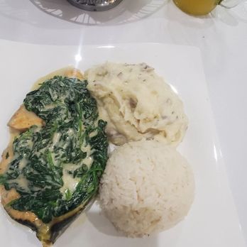 Sodade Restaurant - Salmon with sautéed spinach & coconut sauce. - Portuguese Near Me - Brockton, Massachusetts Sodade Restaurant - Salmon with sautéed spinach & coconut sauce. - Portuguese Near Me - Brockton, Massachusetts
