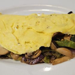 Kellie's Creek Side Bar and Grill - Veggie omelette stuffed full of vegetables and cheese