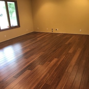 Millworks - a hardwood floor in an empty room - Flooring Near Me - Pekin, Illinois