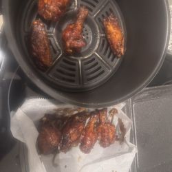 J.R. Crickets McDonough - Please see the eight wings received that I had to warm in an air fryer after returning from a funeral not the dinner I wanted or the issue
