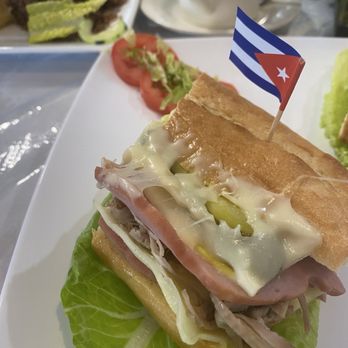 El Carreton Cubano - Cuban sandwich with China box roasted pork, ham, & Swiss. - Cuban Near Me - Suffolk, Virginia