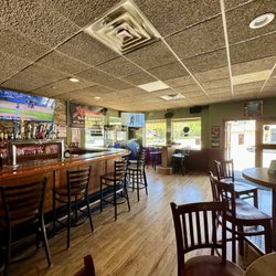Magoo's On The Mound - Inside bar area with tvs