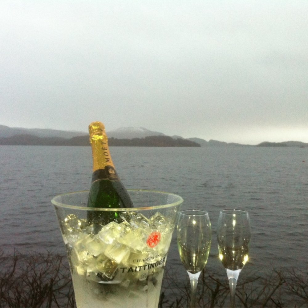 Lodge on Loch Lomond - View from our balcony and a wee treat wee afforded ourselves! Cheers. - Hotels Near Me - Argyll, WDU Lodge on Loch Lomond - View from our balcony and a wee treat wee afforded ourselves! Cheers. - Hotels Near Me - Argyll, WDU