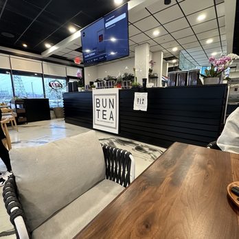 Bun Mee - Bun Tea - a man sitting at a table - Vietnamese Near Me - Shakopee, Minnesota Bun Mee - Bun Tea - a man sitting at a table - Vietnamese Near Me - Shakopee, Minnesota