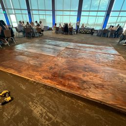 dancefloor wet stain spots can be seen while everyone is sitting for dinner along with unsafe edge dancefloor wet stain spots can be seen while everyone is sitting for dinner along with unsafe edge