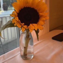 Il Giardino by John Gambino - Beautiful sunflower on the table