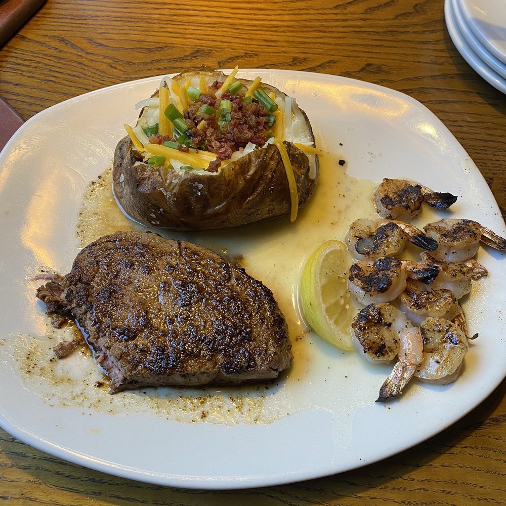 Outback Steakhouse - NEW Reef and Beef Platter (not a filet, no scallops as they ran out and the smallest and wateriest burnt shrimp) - Steakhouses Near Me - Visalia, California