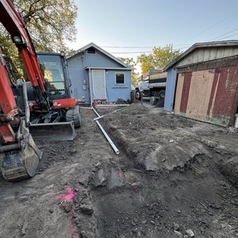 C3 Enterprise - Downspout drains going to drainage hole to be filled with drain rock - Excavation Services Near Me - Phoenix, Oregon C3 Enterprise - Downspout drains going to drainage hole to be filled with drain rock - Excavation Services Near Me - Phoenix, Oregon