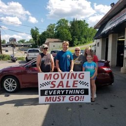 Me and my family after purchasing a2010 Nissan Altima, my first car. Me and my family after purchasing a2010 Nissan Altima, my first car.