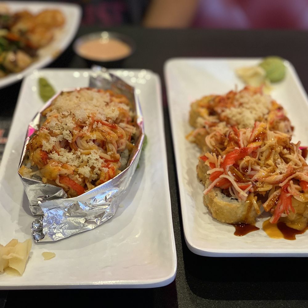 Rock N Roll Sushi - Volcano Roll (left) and Thriller Roll (right) - Sushi Bars Near Me - Tallahassee, Florida Rock N Roll Sushi - Volcano Roll (left) and Thriller Roll (right) - Sushi Bars Near Me - Tallahassee, Florida