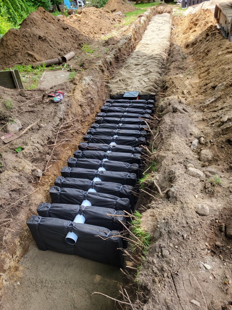 Slide of AJ&J Excavation