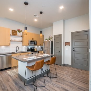 Apartments at Maddie - Step into simplicity and style with our beautiful modern kitchen. - Apartments Near Me - Greeley, Colorado Apartments at Maddie - Step into simplicity and style with our beautiful modern kitchen. - Apartments Near Me - Greeley, Colorado