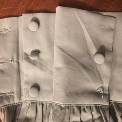 NE Tailor Shop - One missing button and the other button fell right off after he reinforced the buttons