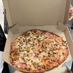 Domino's Pizza - Large thin crust three topping pizza. Italian sausage, ham and beef