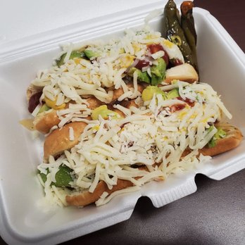 Javi's Tacos - Bacon wrapped hot dogs w/ cheese and avocado. Made to order.. Javi and wife, Thank you. - Food Trucks Near Me - Highland Park, California