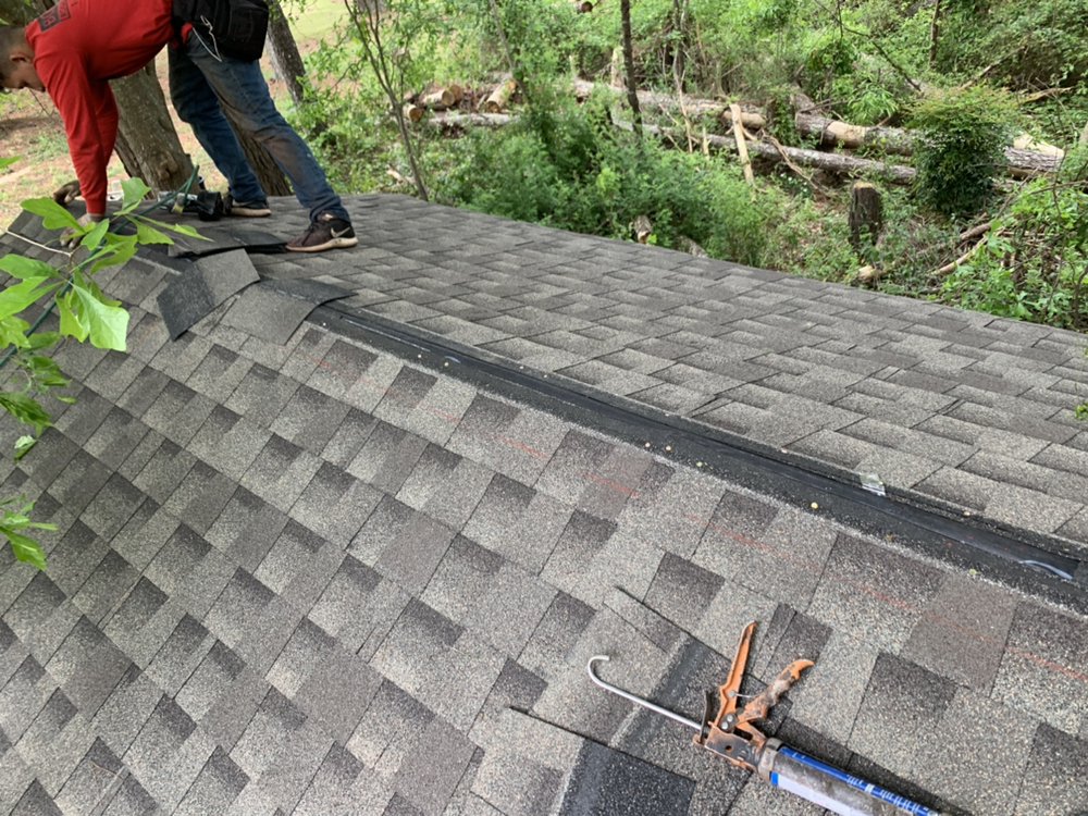 Slide of Rocco’s Roofing