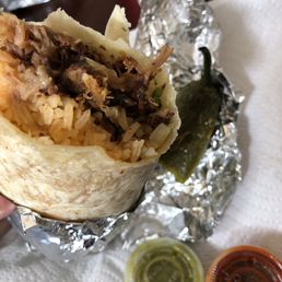 Regular burrito with carnitas. Grilled jalapeño Regular burrito with carnitas. Grilled jalapeño