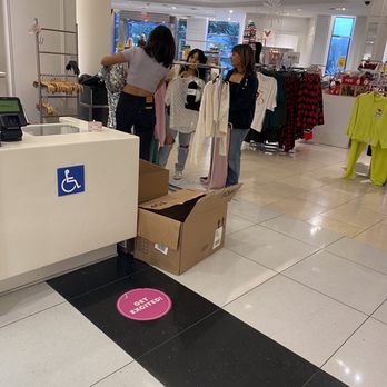 Forever 21 - Employees by rack of clothes chatting while the other two girls are working the register and the line was long. - Accessories Near Me - West Covina, California Forever 21 - Employees by rack of clothes chatting while the other two girls are working the register and the line was long. - Accessories Near Me - West Covina, California