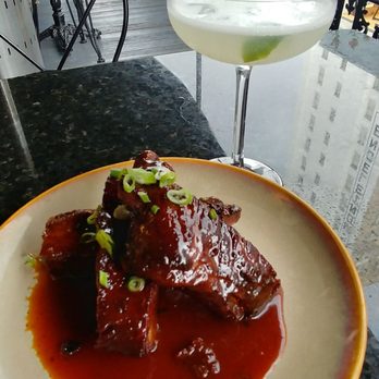 Curio Bistro - Candied fried pork rib appetizer - Cajun/Creole Near Me - New Orleans, Louisiana