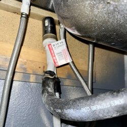 This air gap for a dishwasher was moved under the sink when they put a soap dispenser. It's better to drill an extra hole on the counter.
