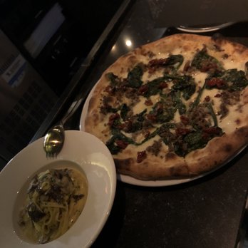 FIKO - Special pizza of that day. Smoked cheese, spinach, sun dried tomatoes, minced meat. - Italian Near Me - Amsterdam, New Hampshire FIKO - Special pizza of that day. Smoked cheese, spinach, sun dried tomatoes, minced meat. - Italian Near Me - Amsterdam, New Hampshire