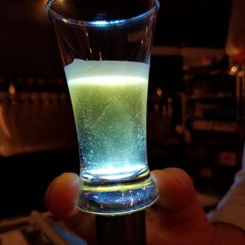 Local Boys Tap Room - a shot of green liquid in a shot glass - Beer Bar Near Me - Gig Harbor, Washington Local Boys Tap Room - a shot of green liquid in a shot glass - Beer Bar Near Me - Gig Harbor, Washington