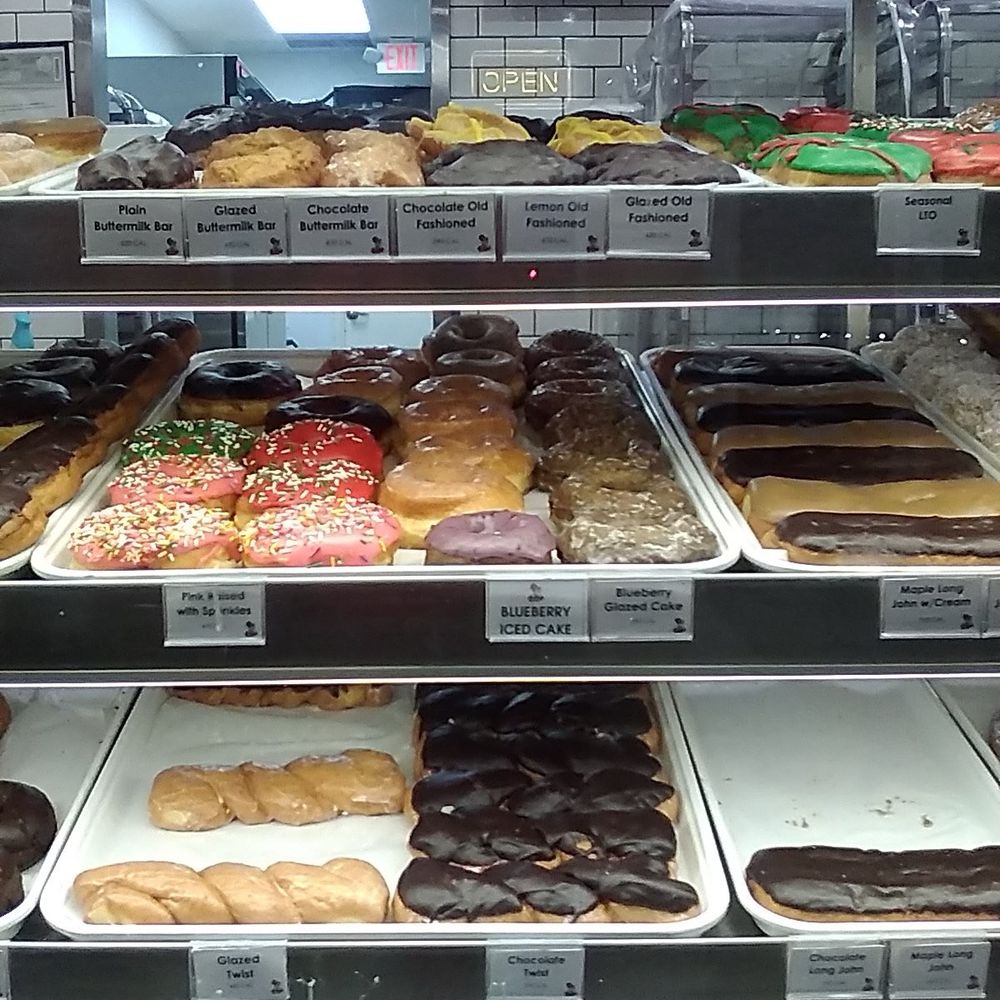 Randy’s Donuts - donuts of all kinds, sizes and colors. Full case. - Donuts Near Me - Los Angeles, California