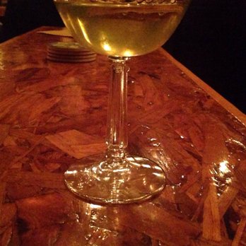 Shaw's - a glass of wine on a bar - Bars Near Me - Washington, DC, District of Columbia
