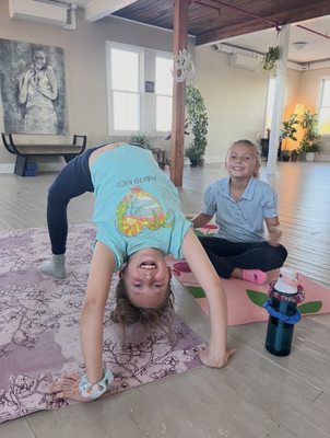 Children’s Yoga - Children’s Yoga at Ocean Bliss Yoga offers a fun and supportive space where kids can move, breathe, and explore mindfulness through play. Classes incorporate yoga poses, games, breathing exercises, and relaxation techniques that help children build strength, coordination, focus, and confidence. It’s a joyful way for kids to connect with their bodies, calm their minds, and develop healthy habits that can support them for life. Children’s Yoga - Children’s Yoga at Ocean Bliss Yoga offers a fun and supportive space where kids can move, breathe, and explore mindfulness through play. Classes incorporate yoga poses, games, breathing exercises, and relaxation techniques that help children build strength, coordination, focus, and confidence. It’s a joyful way for kids to connect with their bodies, calm their minds, and develop healthy habits that can support them for life.
