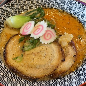 3 Little Pigs Ramen - Tonkotsu with thick noodles, pork, fish cakes, boy choy, rice cakes, spicy oil, and garlic. - Ramen Near Me - Katy, Texas