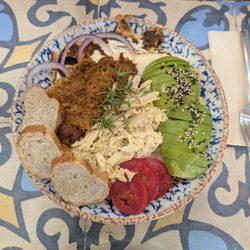 Ojo De Agua - Rancheros del Ojo with chicken, pork (?), and avocado.